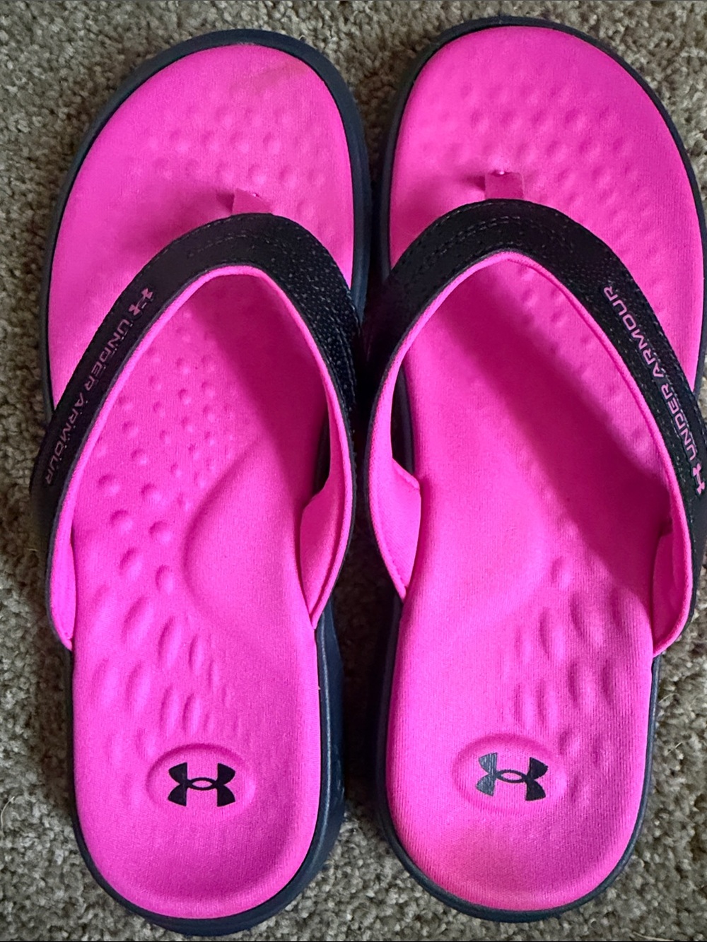 Under Armour Hot Pink and Black Cushioned Flip Flops.